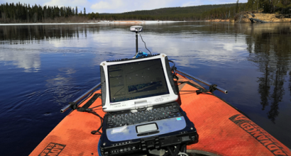 Research laptop on a floating measuring station in a river environment